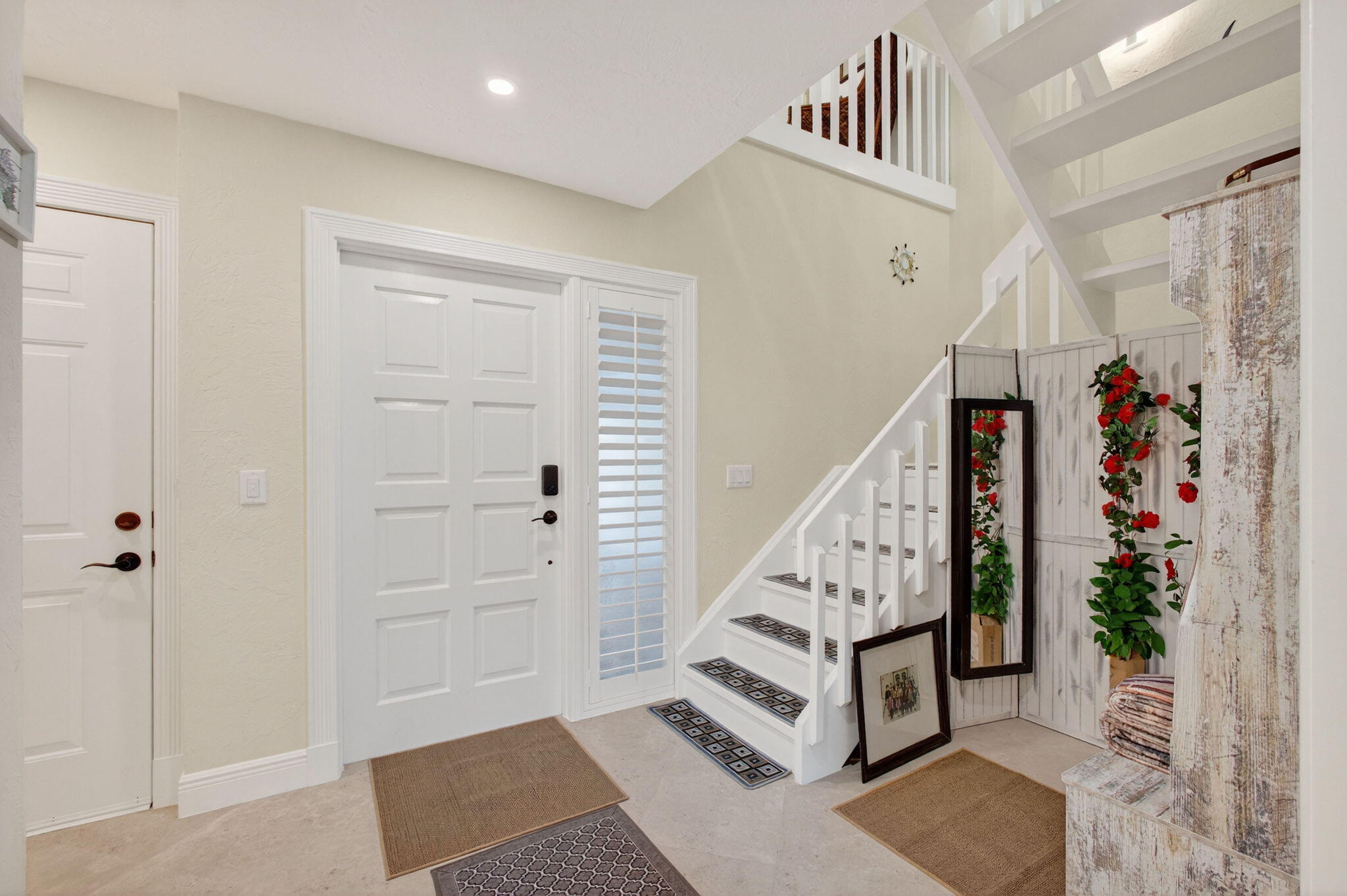 170 Celestial Way, Unit 35 Juno Beach, FL 33408 - Photo 3 of 53 a view of an entryway with staircase