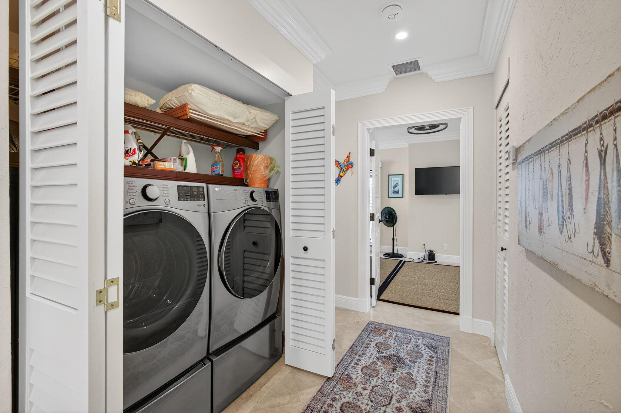 170 Celestial Way, Unit 35 Juno Beach, FL 33408 - Photo 31 of 53 a utility room with dryer and washer