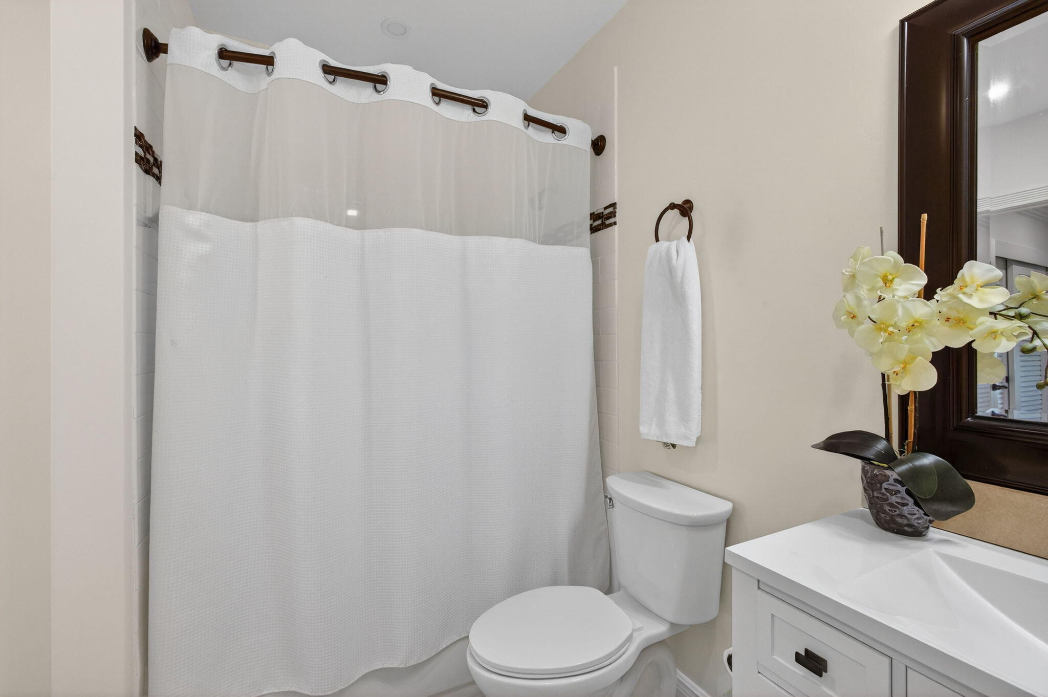 170 Celestial Way, Unit 35 Juno Beach, FL 33408 - Photo 41 of 53 a bathroom with a sink a toilet and a mirror
