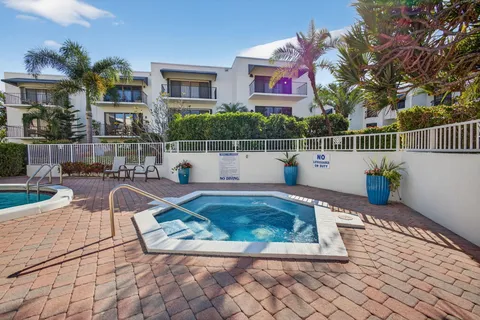 a view of building with outdoor space and seating area