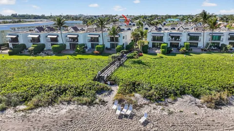 a view of a chairs and table in a patio