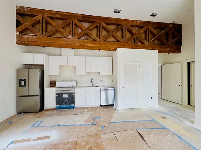 a utility room with washer and dryer