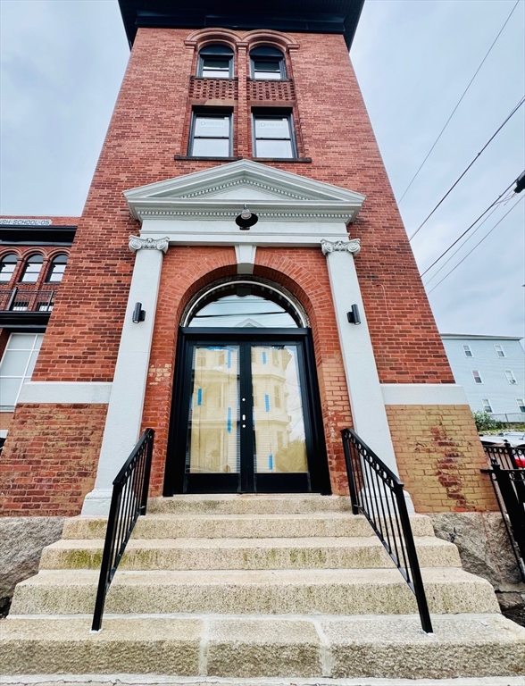 403 Division Street, Unit 13 Fall River, MA 02721 - Photo 2 of 29 a view of a brick building