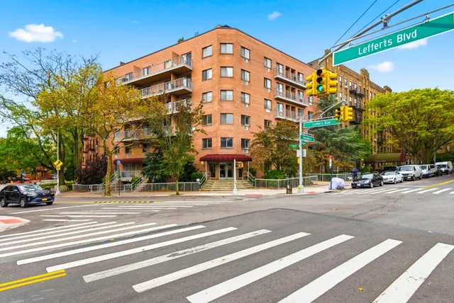 a view of a building and a street