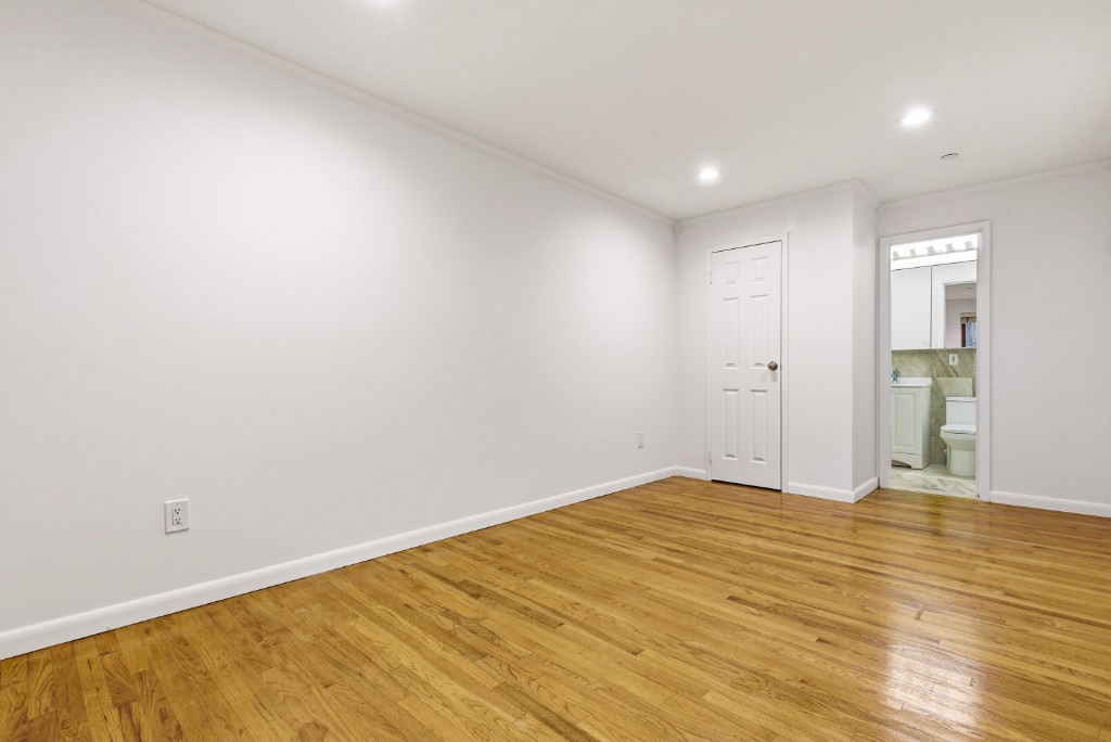 118-82 Metropolitan Avenue, Unit 3A Queens, NY 11415 - Photo 13 of 19 a view of empty room