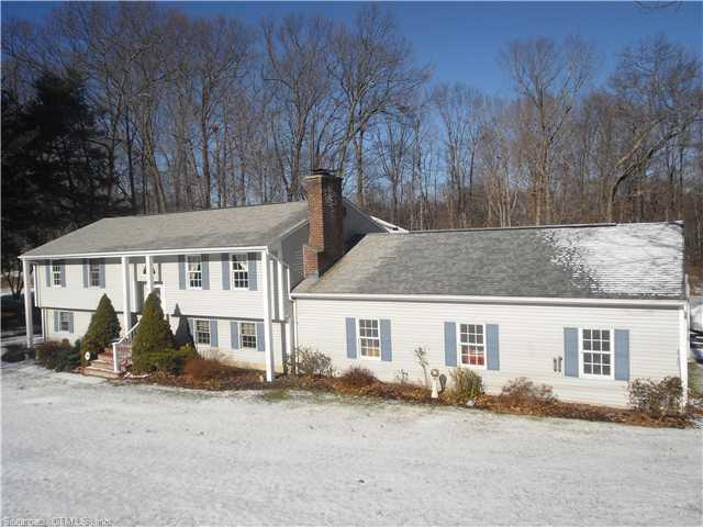487 Radmere Road Cheshire, CT 06410 - Photo 1 of 1 front view of a house with a yard