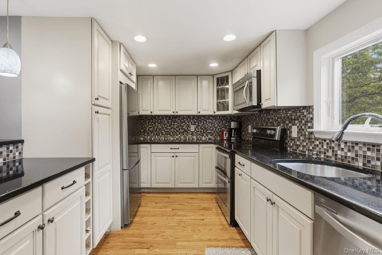 5 Adair Road Cortlandt Manor, NY 10567 - Photo 3 of 36 Gourmet kitchen, granite counter tops, mosaic backsplash, stainless steel appliances and great amount of storage.