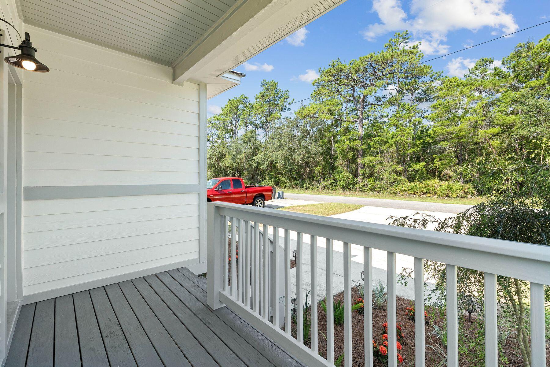 229 County Line Road Niceville, FL 32578 - Photo 39 of 43 a view of a balcony with wooden floor