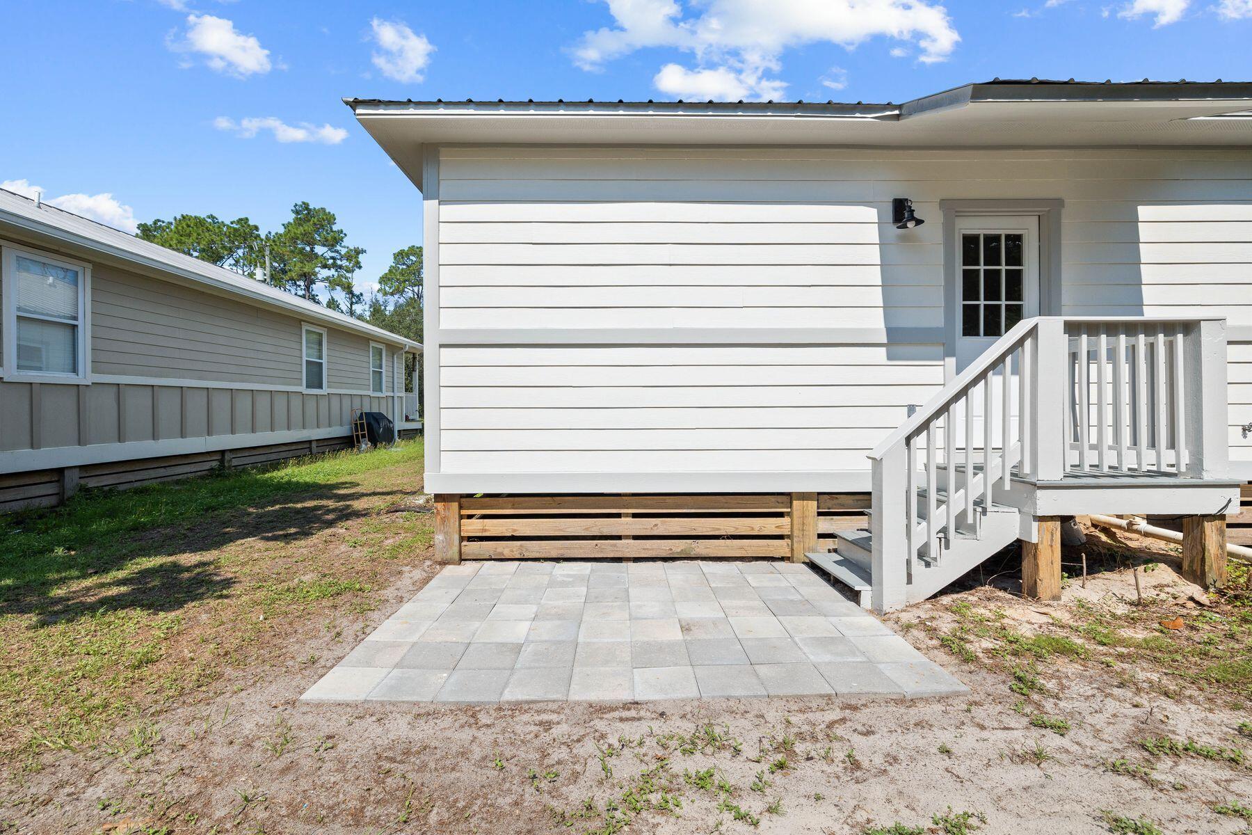 229 County Line Road Niceville, FL 32578 - Photo 43 of 43 a view of a house with a yard