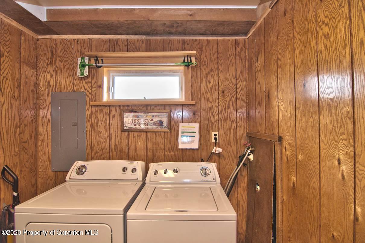 293 State Rte 1002 Tunkhannock, PA 18657 - Photo 22 of 71 a view of bathroom with washer and dryer