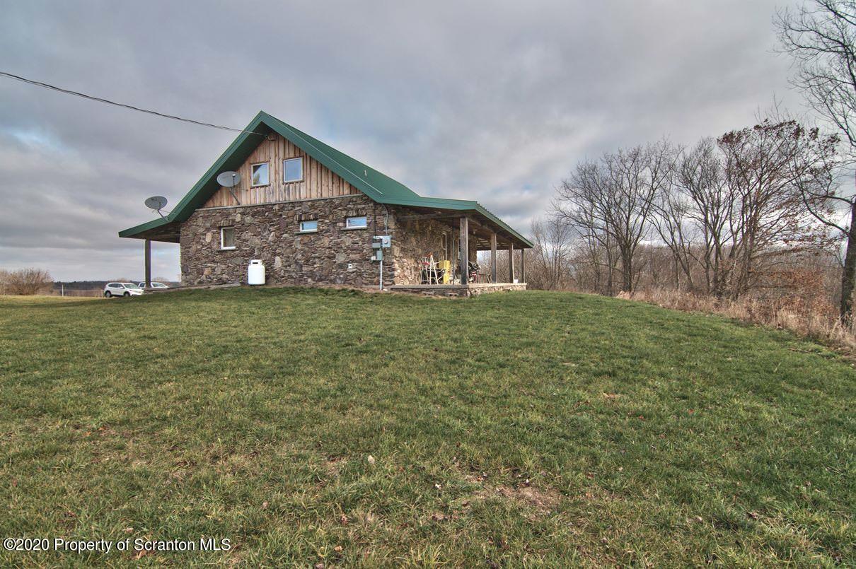 293 State Rte 1002 Tunkhannock, PA 18657 - Photo 43 of 71 a view of a house with a big yard and large trees
