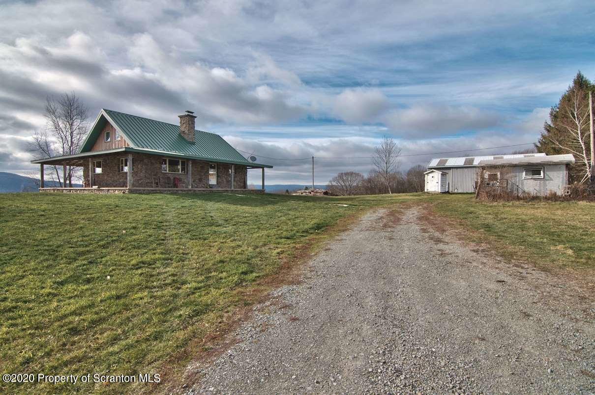 293 State Rte 1002 Tunkhannock, PA 18657 - Photo 66 of 71 a view of a big house with a big yard and large tree
