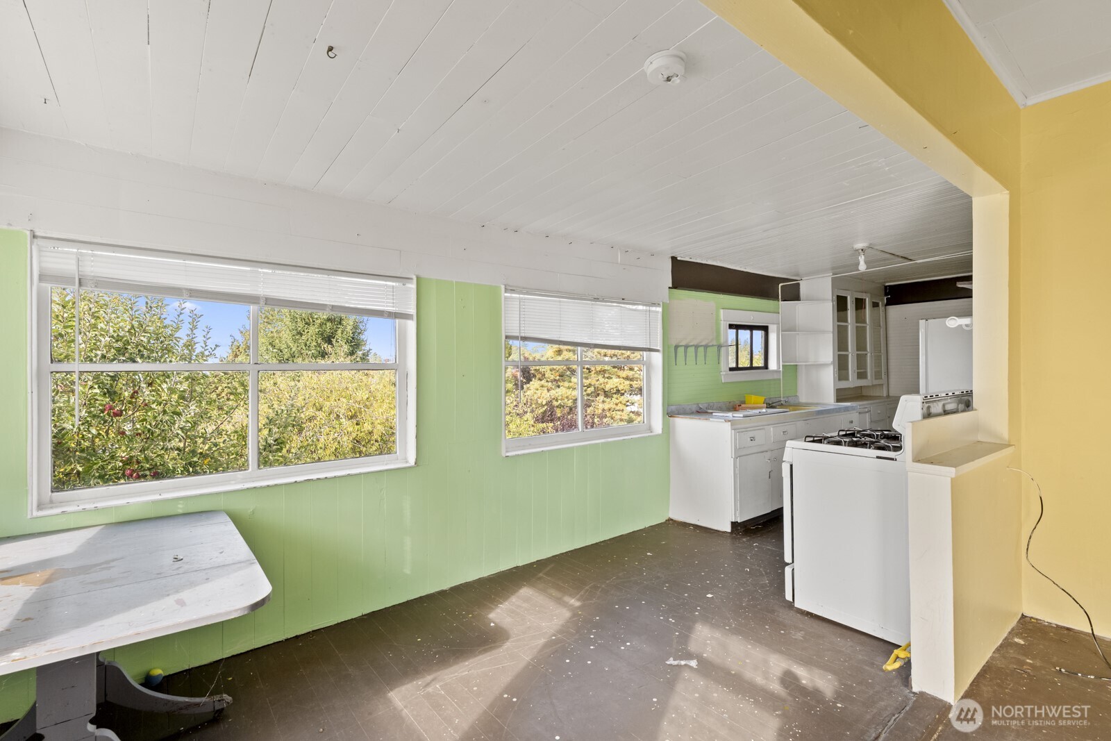 4812 46th Avenue Southwest Seattle, WA 98116 - Photo 16 of 26 a room with furniture and window