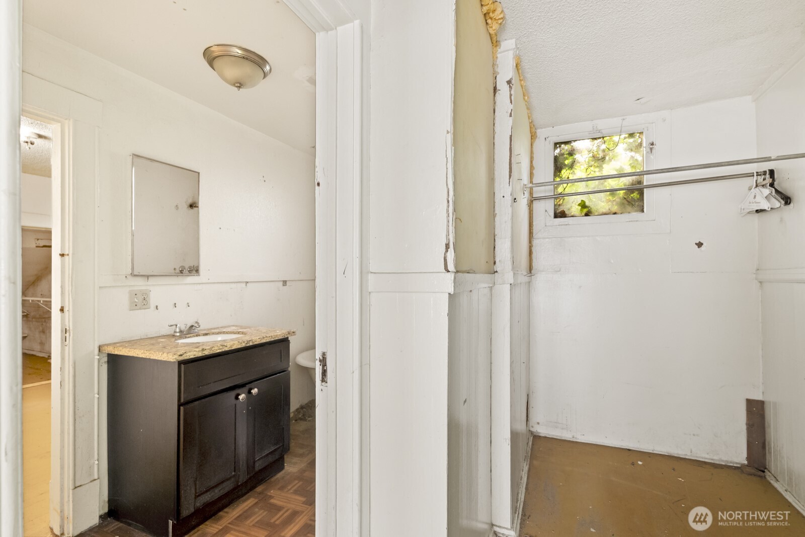 4812 46th Avenue Southwest Seattle, WA 98116 - Photo 22 of 26 a bathroom with a sink and a mirror