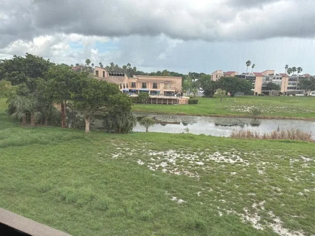 a view of a lake and outdoor space