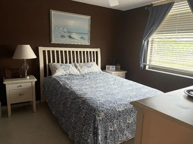 a bathroom with a toilet sink and shower