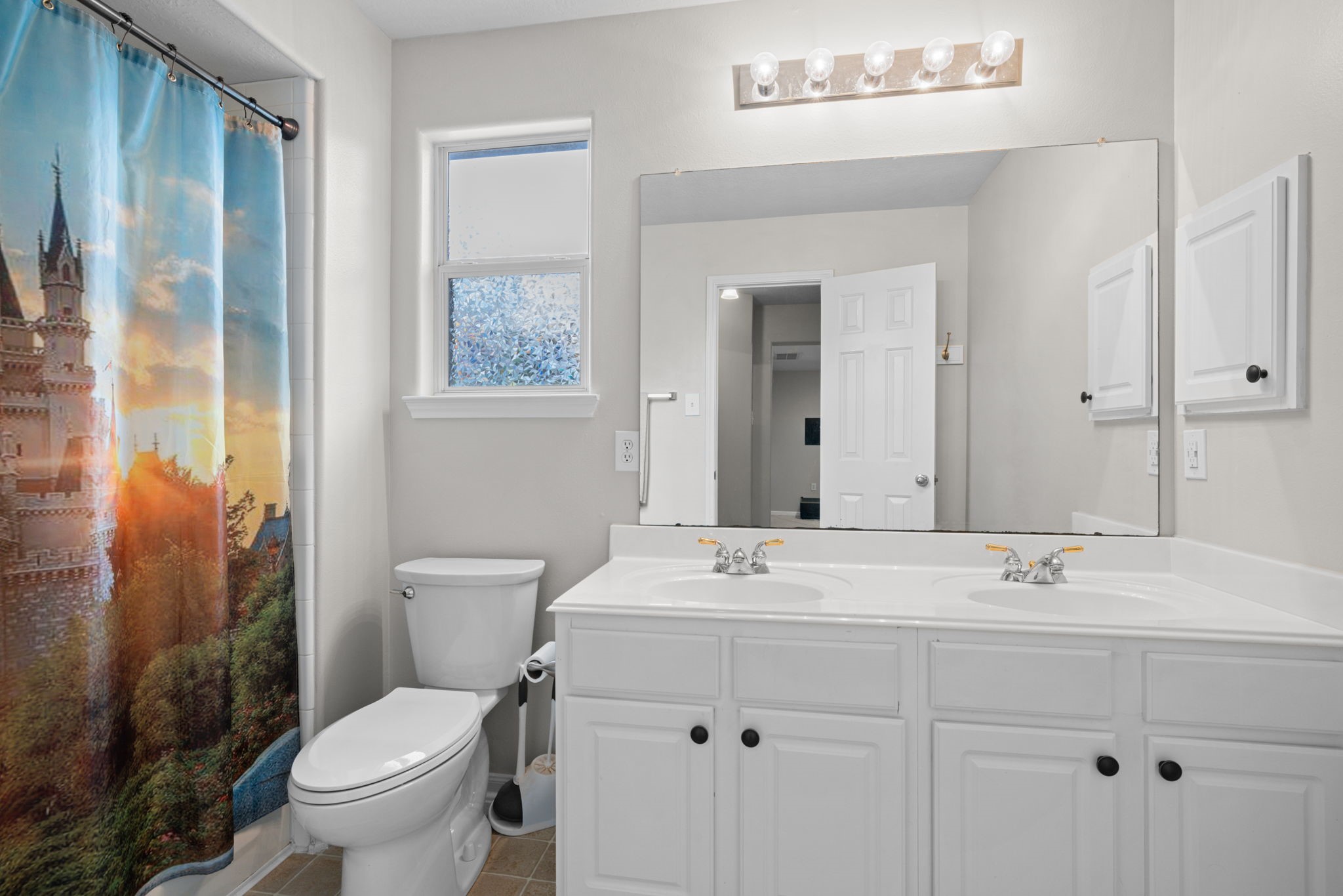 19114 Emory Trail Spring, TX 77388 - Photo 34 of 44 a bathroom with a sink a toilet and shower