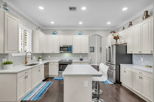 a bed room with furniture and a window