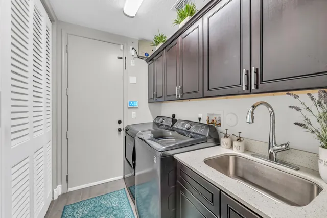 a bedroom with a bed and a table with chair