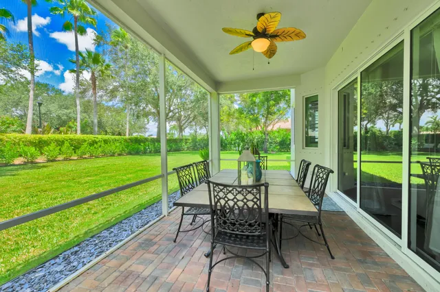 an aerial view of a house with a garden and swimming pool