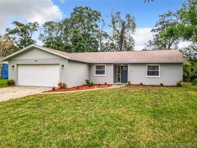 a view of outdoor space yard and garage