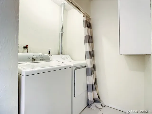 a bathroom with a granite countertop sink toilet a mirror a vanity and shower