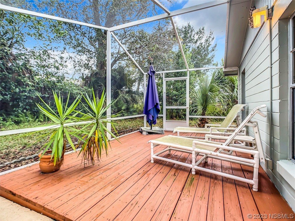 865 North Ridgewood Avenue Ormond Beach, FL 32174 - Photo 6 of 32 a view of balcony with a patio