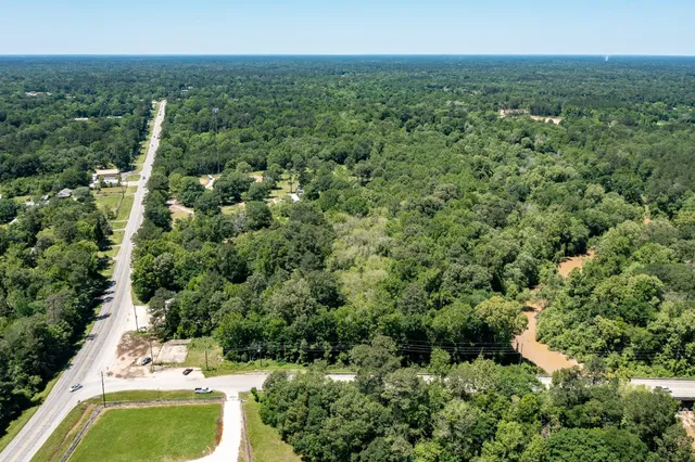 an aerial view of residential house with outdoor space