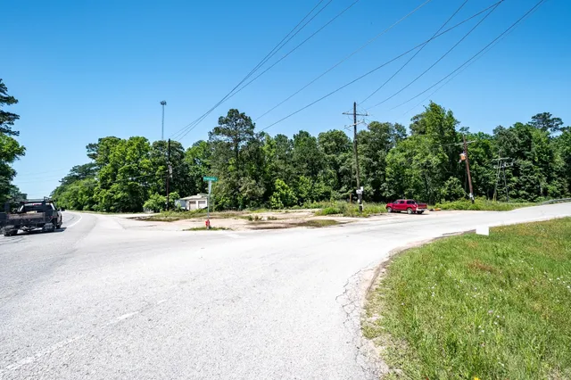 a view of a swimming pool with an outdoor space and seating area