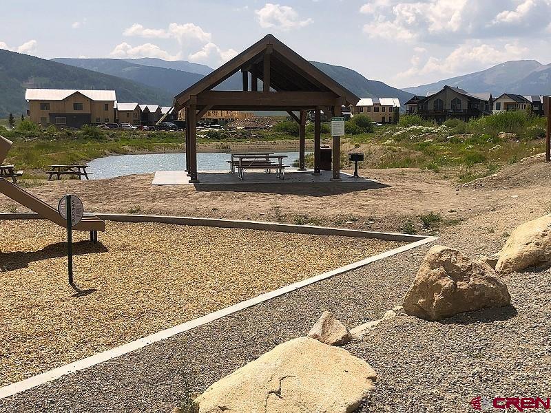 84 Chestnut Lane Crested Butte, CO 81224 - Photo 22 of 28 a view of a house with a yard
