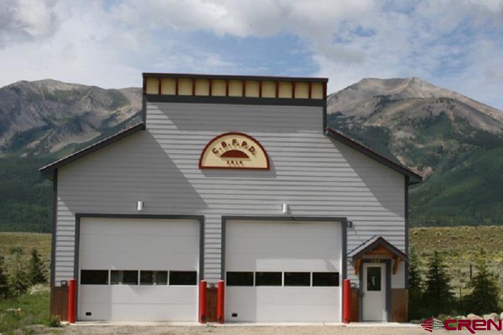 84 Chestnut Lane Crested Butte, CO 81224 - Photo 24 of 28 a front view of a house with garage