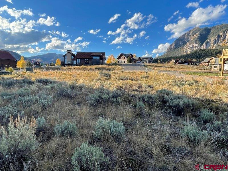 84 Chestnut Lane Crested Butte, CO 81224 - Photo 7 of 28 a view of a lake with houses