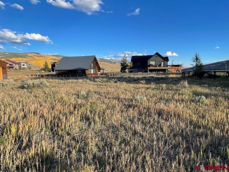84 Chestnut Lane Crested Butte, CO 81224 - Photo 10 of 28 a view of a house with a yard