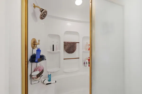 a bathroom with a sink and mirror