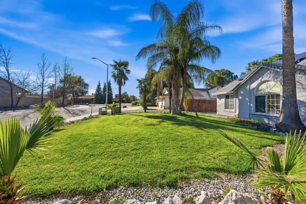 a house view with a garden space