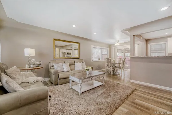 a living room with furniture and a table