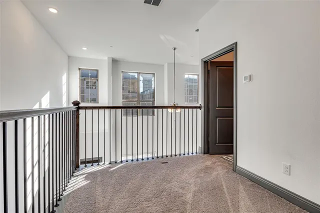 a kitchen with stainless steel appliances kitchen island granite countertop a sink and cabinets