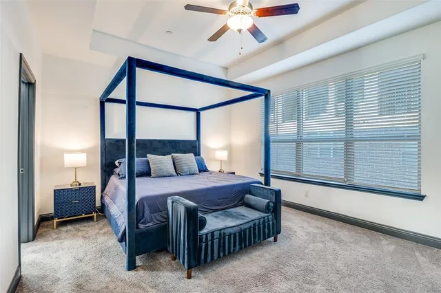 a kitchen with a stove a sink and a refrigerator