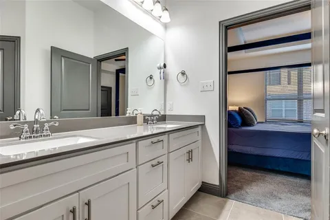 a kitchen with a stove a sink and a microwave