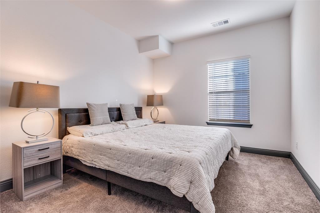 8132 Foraker Street Frisco, TX 75034 - Photo 13 of 25 Carpeted bedroom with baseboards