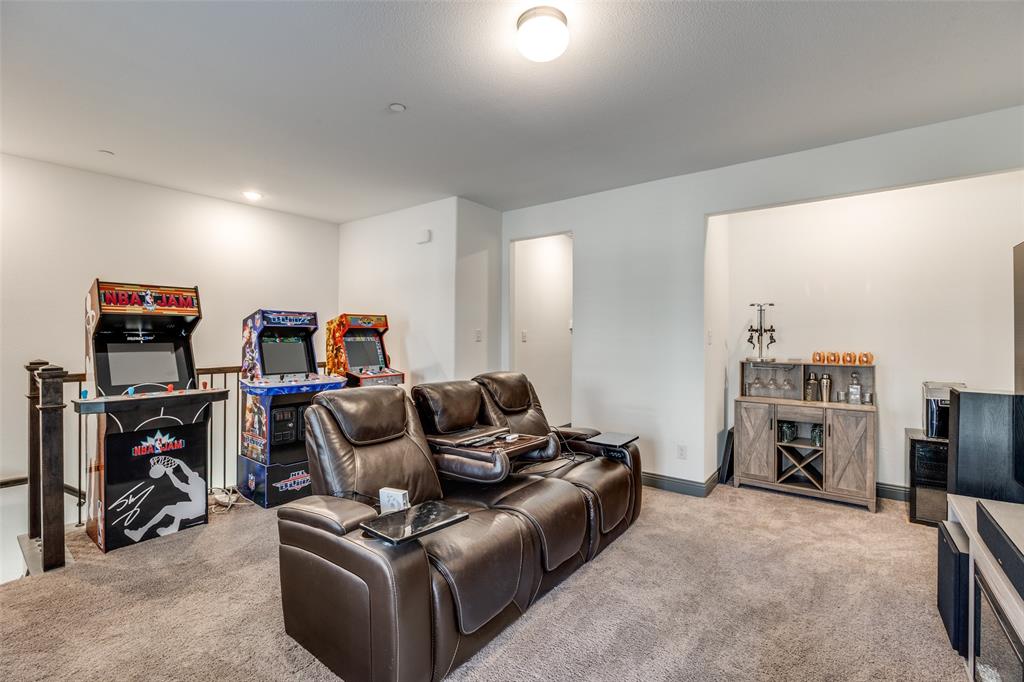 8132 Foraker Street Frisco, TX 75034 - Photo 16 of 25 Living area with light carpet and recessed lighting