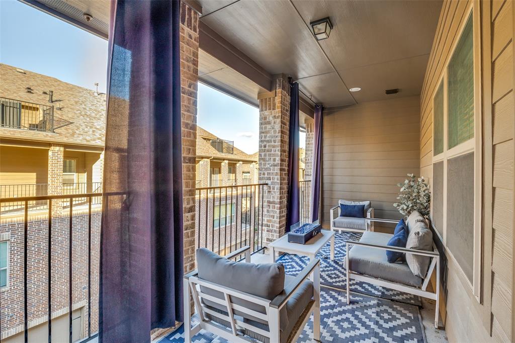 8132 Foraker Street Frisco, TX 75034 - Photo 20 of 25 Balcony with an outdoor hangout area