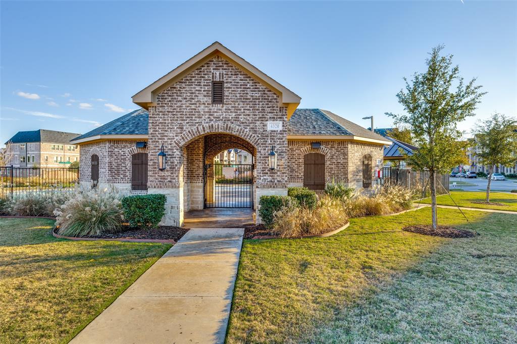 8132 Foraker Street Frisco, TX 75034 - Photo 21 of 25 French country inspired facade with brick siding and a shingled roof