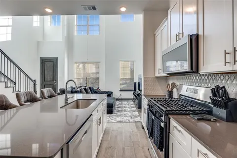 a house view with swimming pool