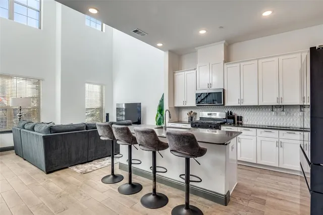 a view of a patio with swimming pool