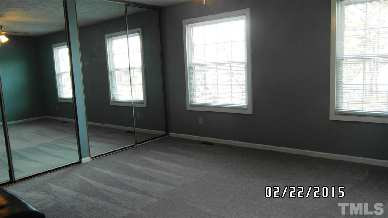 8184 McGuire Drive Raleigh, NC 27616 - Photo 15 of 23 an empty room with a window