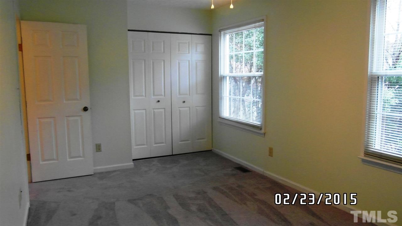 8184 McGuire Drive Raleigh, NC 27616 - Photo 17 of 23 a view of an empty room with window