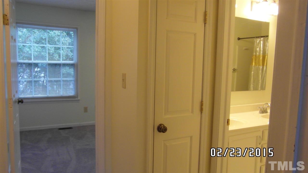 8184 McGuire Drive Raleigh, NC 27616 - Photo 22 of 23 a bathroom with a window