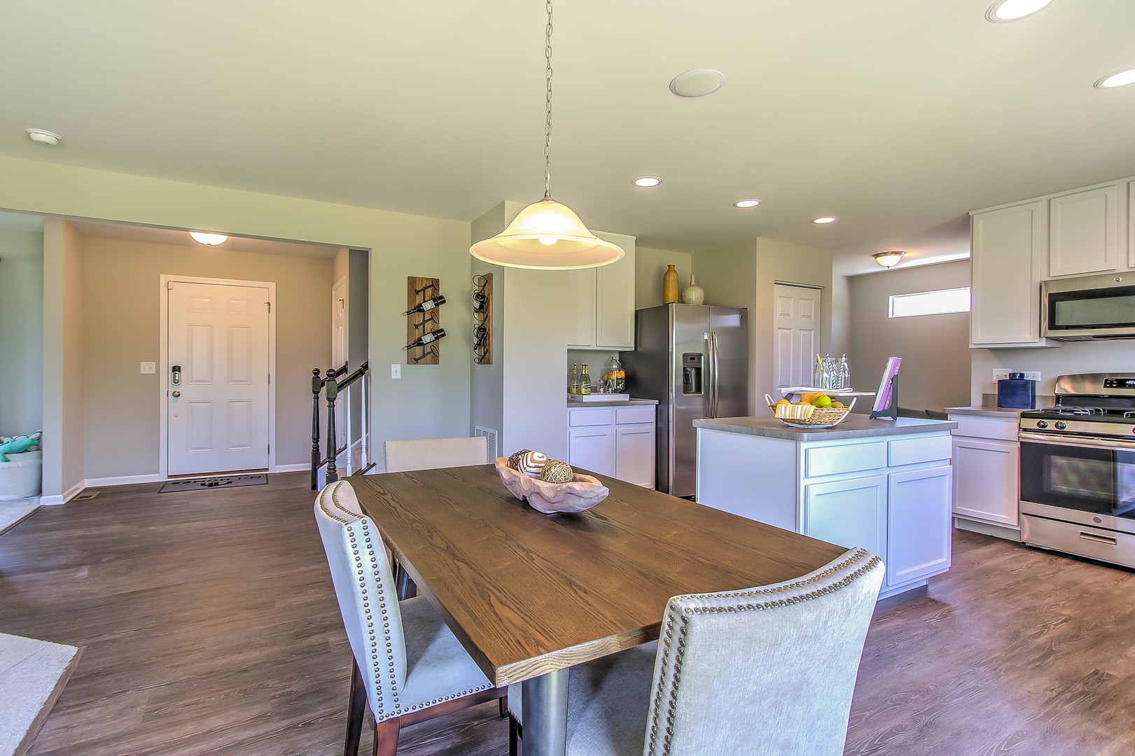 1030 Sharp Drive Plano, IL 60545 - Photo 11 of 36 a kitchen with a table and chairs