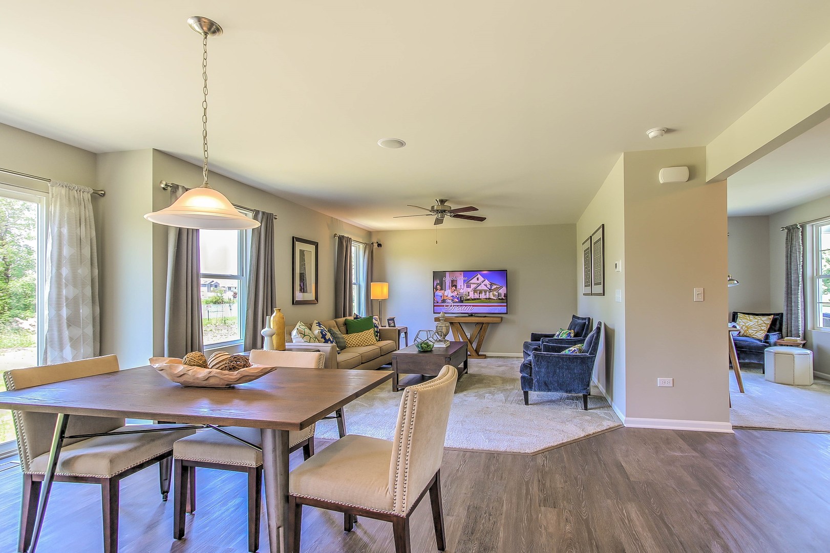 1030 Sharp Drive Plano, IL 60545 - Photo 14 of 36 a view of a dining room with furniture window and wooden floor